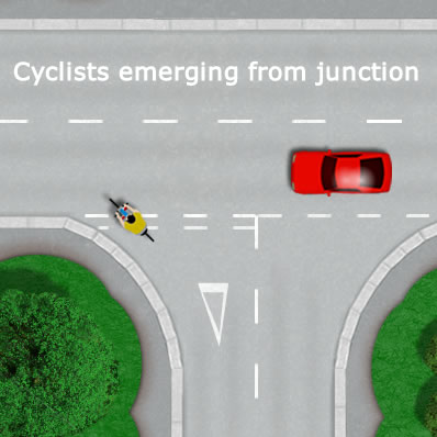 Cyclist Emerging from a Junction