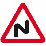 Double bend in road ahead sign
