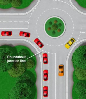 Turning left at roundabout